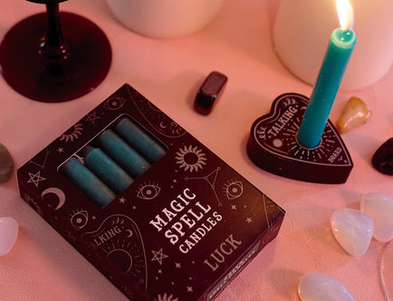 Magic Spell: Paquete de 12 velas de hechizo verdes de 'Suerte'.